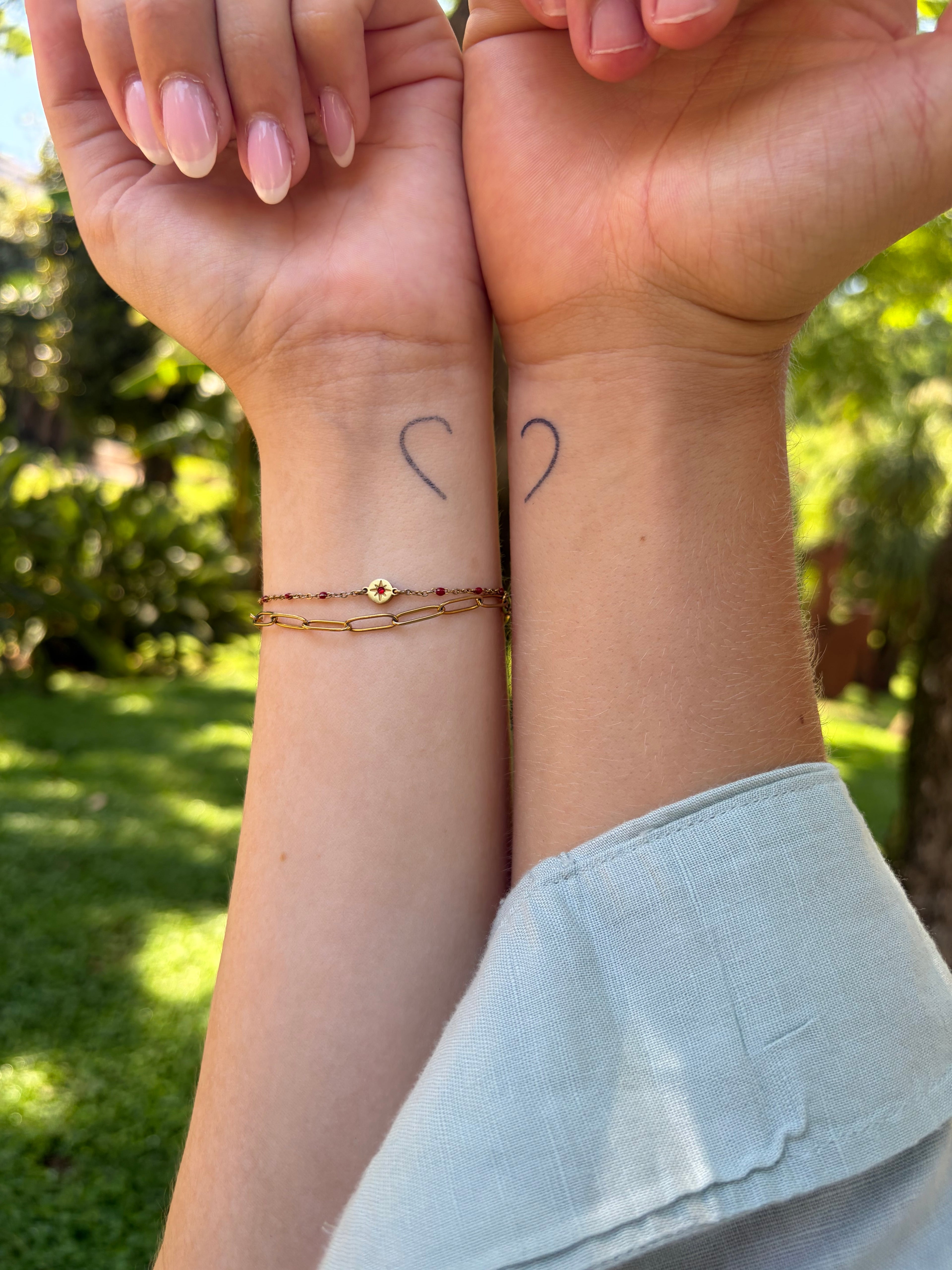 Split heart tattoo