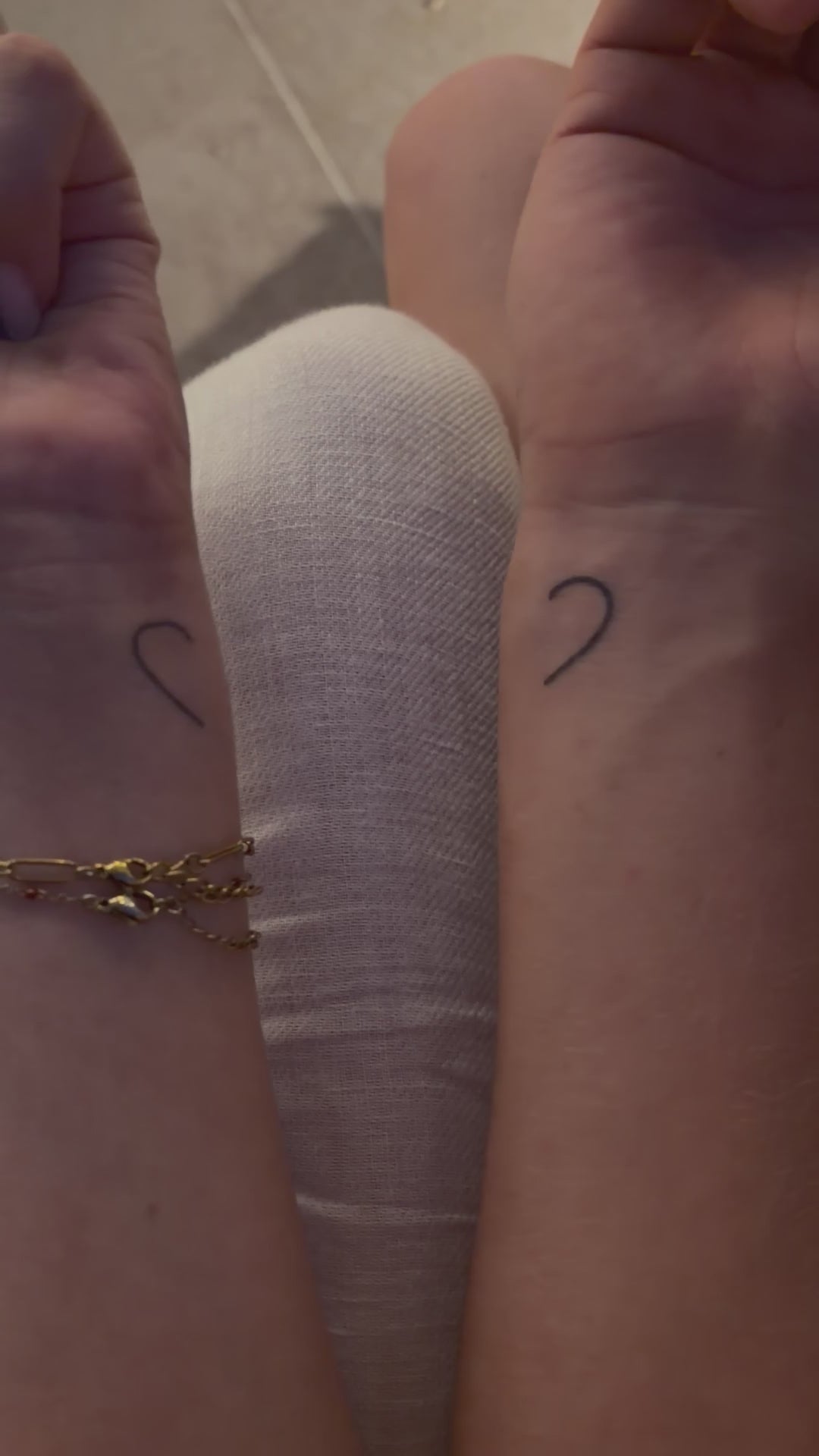 Split heart tattoo